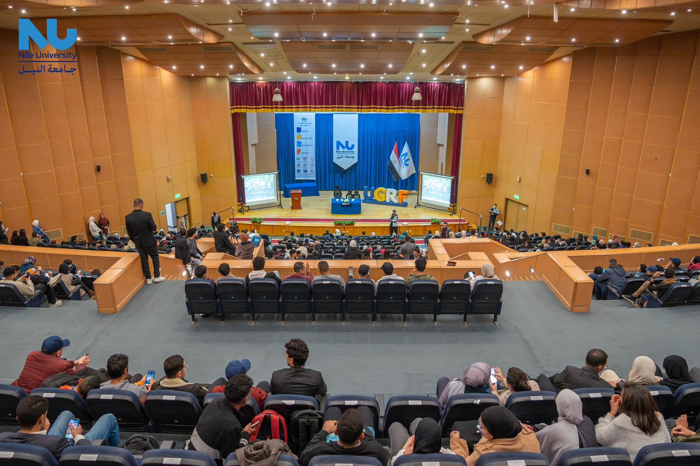 Students presenting research projects at Nile University’s Undergraduate Research Forum.